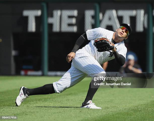 Avisail Garcia of the Chicago White Sox looses a fly ball in the sun against the Oakland Athletics at Guaranteed Rate Field on June 23, 2018 in...