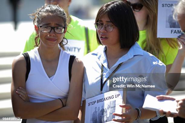 Sisters Nicole Edralin and Michelle Edralin from Highland Park, New Jersey, whose father Cloyd Edralin was apprehended by ICE agents, gather outside...