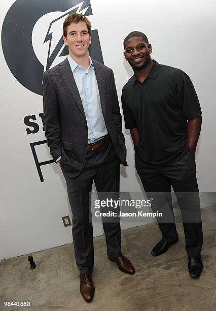 Football players Eli Manning of the New York Giants and LaDainian Tomlinson of the New York Jets attend the launch of G Series Pro by Gatorade at 40...