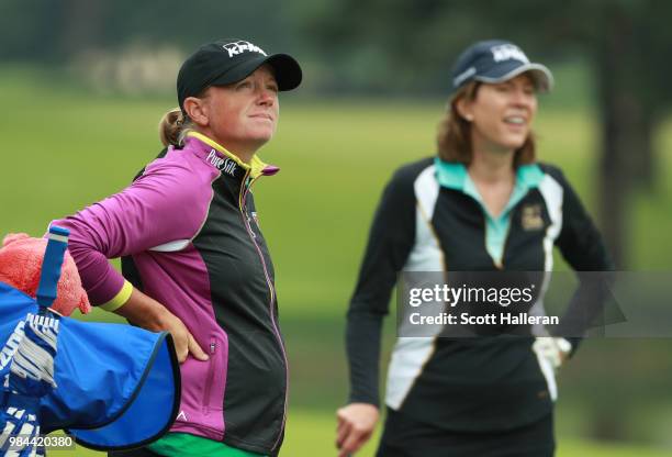 Stacy Lewis, watches a shot with Lynne Doughtie, Chairman and CEO of KPMG, during the pro-am prior to the start of the KPMG Women's PGA Championship...