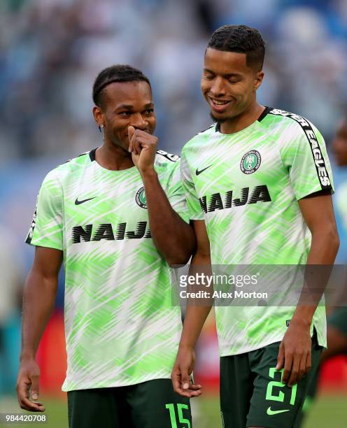 Joel Obi of Nigeria talks to Tyronne Ebuehi of Nigeria during warm up prior to the 2018 FIFA World Cup Russia group D match between Nigeria and...