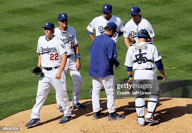 Starting pitcher Clayton Kershaw of the Los Angeles Dodgers is taken out of the game in the sixth inning against the Arizona Diamondbacks during the...