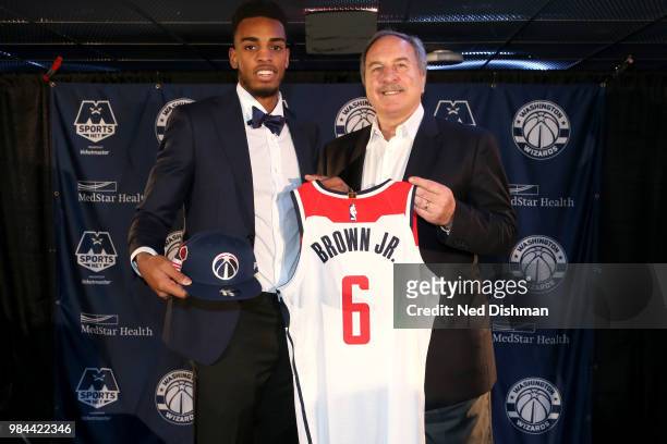 Washington Wizards first-round draft pick Troy Brown Jr. Poses for a photo with Ernie Grunfeld during a press conference on June 25, 2018 at Capital...