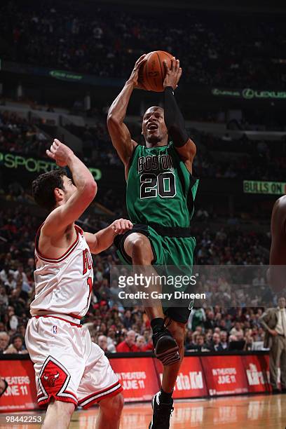 Ray Allen of the Boston Celtics goes up for a layup against Kirk Hinrich of the Chicago Bulls on April 13, 2010 at the United Center in Chicago,...