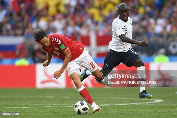 Denmark's midfielder Thomas Delaney vies with France's midfielder N'Golo Kante during the Russia 2018 World Cup Group C football match between...