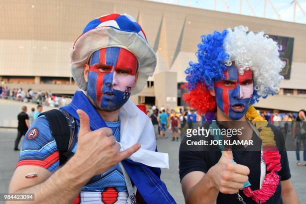An Iceland's supporter poses ahead of the Russia 2018 World Cup Group D football match between Iceland and Croatia outstide the Rostov Arena in...