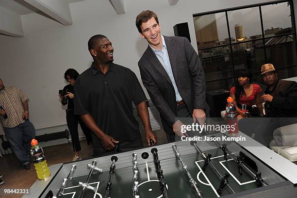 Football players LaDainian Tomlinson of the New York Jets and Eli Manning of the New York Giants attend the launch of G Series Pro by Gatorade at 40...