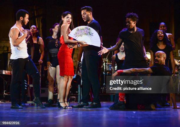 June 2018, Germany, Cuba: Luna Manzanares Nardo as Carmen and the ensemble performing onstage at the first Cuban musical "Carmen la Cubana" at the...