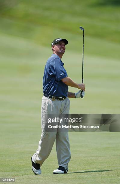 Jerry Kelly hits out of the third fairway during the final round of the Advil Western Open July 7, 2002 at Cog Hill Golf and Country Club in Lemont,...