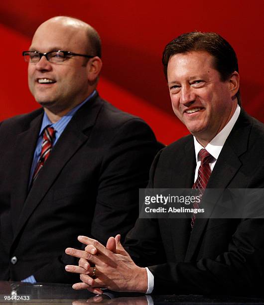 Edmonton Oilers GM Steve Tambellini speaks with Boston Bruins GM Peter Chiarelli after Edmonton was awarded the first overall pick during the NHL...