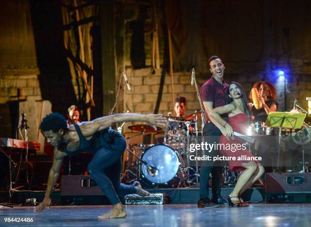 June 2018, Germany, Cuba: Luna Manzanares Nardo as Carmen and the ensemble performing onstage at the first Cuban musical "Carmen la Cubana" at the...