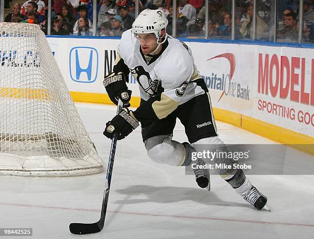 Alex Goligoski of the Pittsburgh Penguins skates against the New York Islanders on April 11, 2010 at Nassau Coliseum in Uniondale, New York. Penguins...