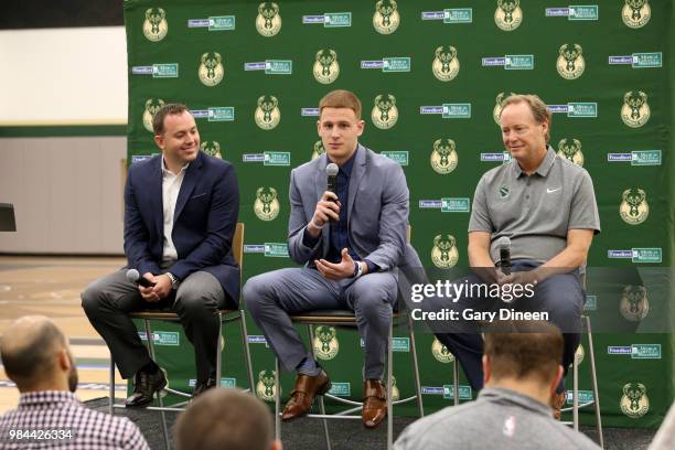 Milwaukee Bucks general manager Jon Horst and head coach Mike Budenholzer introduce Donte DiVincenzo during a press conference on June 25, 2018 at...