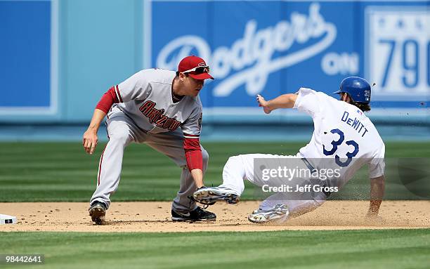 Blake DeWitt of the Los Angeles Dodgers is tagged out on a steal attempt by second baseman Kelly Johnson of the Arizona Diamondbacks in the fourth...