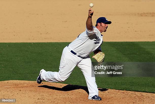 Jonathan Broxton of the Los Angeles Dodgers throws a pitch in the ninth inning against the Arizona Diamondbacks at Dodger Stadium on April 13, 2010...