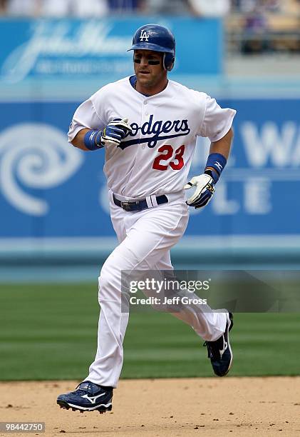 Casey Blake of the Los Angeles Dodgers runs the bases after hitting a two-run homerun in the fourth inning against the Arizona Diamondbacks at Dodger...