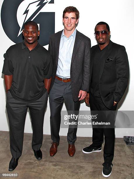 Jets running back, Ladainian Tomlinson, NY Giants quarterback, Eli Manning and record producer, Sean "Diddy" Combs attend the launch of G Series Pro...