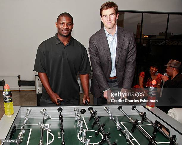 Jets running back, Ladainian Tomlinson and NY Giants quarterback, Eli Manning attend the launch of G Series Pro by Gatorade at 40 Renwick Street on...