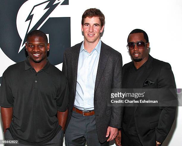 Jets running back, Ladainian Tomlinson, NY Giants quarterback, Eli Manning and record producer, Sean "Diddy" Combs attend the launch of G Series Pro...