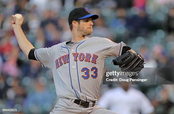 Starting pitcher John Maine of the New York Mets delivers against the Colorado Rockies during Major League Baseball action at Coors Field on April...