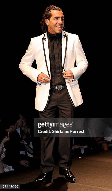 Carlos Tevez models Selfridges collection at Fashion Kicks in aid of Macmillan Cancer Relief at Old Trafford Cricket ground on April 13, 2010 in...