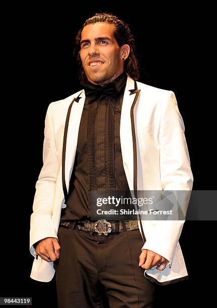 Carlos Tevez models Selfridges collection at Fashion Kicks in aid of Macmillan Cancer Relief at Old Trafford Cricket ground on April 13, 2010 in...