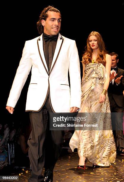 Carlos Tevez models Selfridges collection at Fashion Kicks in aid of Macmillan Cancer Relief at Old Trafford Cricket ground on April 13, 2010 in...