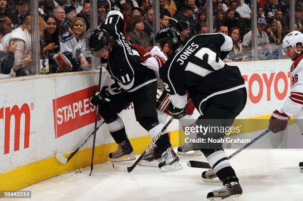 Anze Kopitar and Randy Jones of the Los Angeles Kings battle for the puck in the corner against the Phoenix Coyotes on April 8, 2010 at Staples...