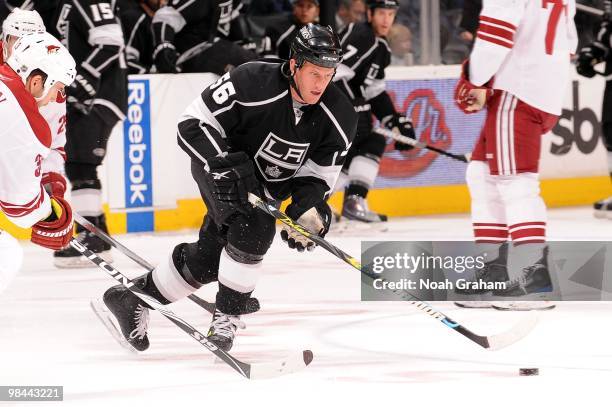 Rich Clune of the Los Angeles Kings skates with the puck against the Phoenix Coyotes on April 8, 2010 at Staples Center in Los Angeles, California.