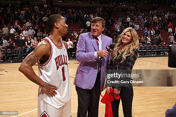 Comentator Craig Sager speaks with Derrick Rose of the Chicago Bulls and model Marisa Miller following a game against the Boston Celtics on April 13,...