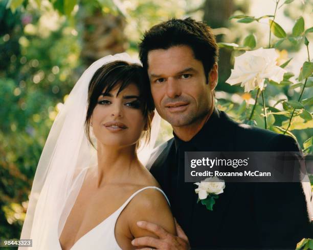 Actors Lisa Rinna and Harry Hamlin pose for a photo after their wedding at their home on March 29, 1997 in Beverly Hills, California.