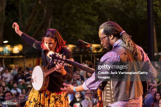 American folk and country singer and multi-instrumentalist Rhiannon Giddens performs on banjo with her band with Hubby Jenkins on guitar at Central...