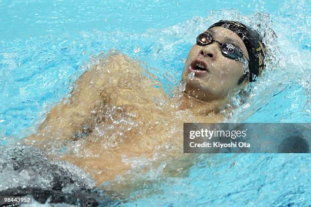 Ryosuke Irie competes in the Men's 100m Backstroke Heat during the day two of the Japan Swim 2010 at Tokyo Tatsumi International Swimming Pool on...