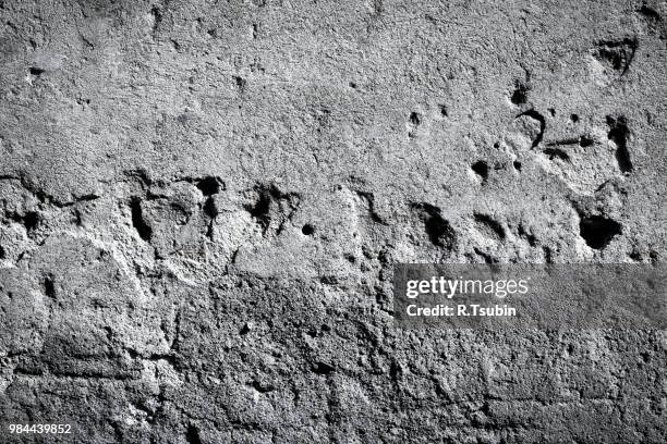 plaster wall background textured - schmiererei stock-fotos und bilder