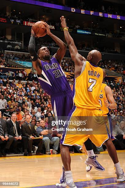 Donte Greene of the Sacramento Kings shoots against Lamar Odom of the Los Angeles Lakers at Staples Center on April 13, 2010 in Los Angeles,...