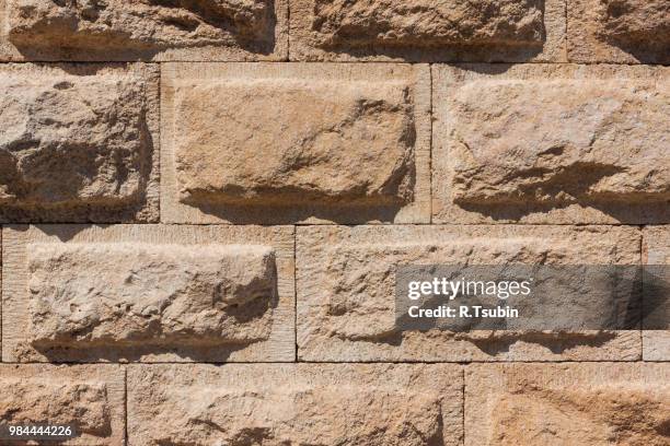 ancient wall texture background tiled - sandstone fence stock pictures, royalty-free photos & images