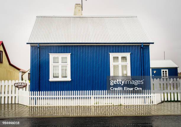 little blue house. - einar orn stock pictures, royalty-free photos & images