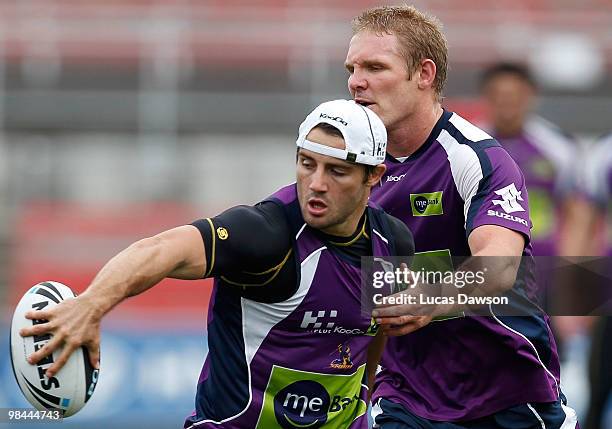 Cooper Cronk passes the ball during a Melbourne Storm NRL training session at Visy Park on April 14, 2010 in Melbourne, Australia.