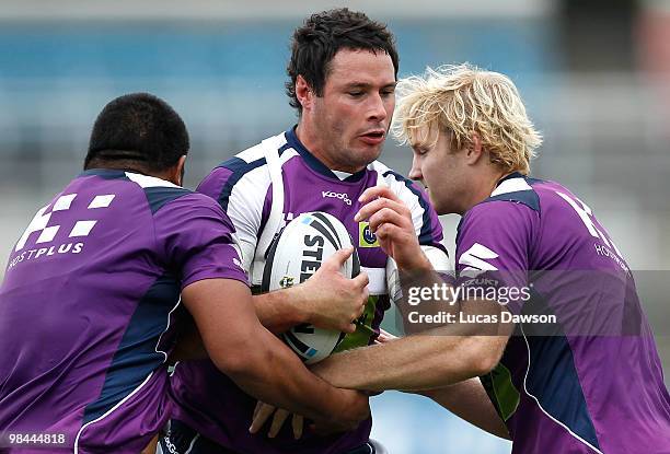 Brett White ia tackled during a Melbourne Storm NRL training session at Visy Park on April 14, 2010 in Melbourne, Australia.