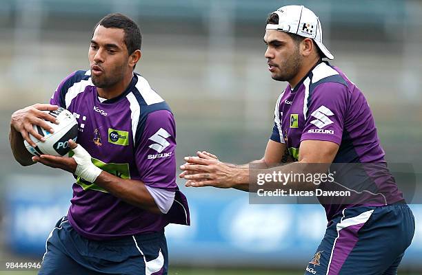 Greg Inglis attempts to tackle Dane Chisholm during a Melbourne Storm NRL training session at Visy Park on April 14, 2010 in Melbourne, Australia.