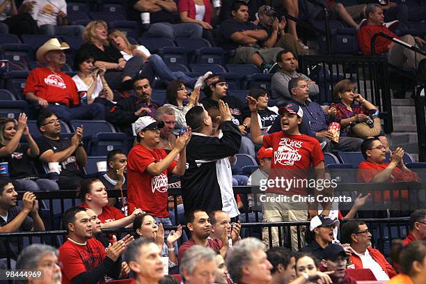 Fans of the Rio Grande Valley Vipers high-five and cheer as their team plays the Reno Bighorns on April 12, 2010 at the State Farm Arena in Hidalgo,...