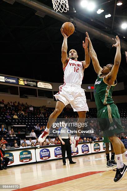 Will Conroy of the Rio Grande Valley Vipers shoots over Will Blalock the Reno Bighorns on April 13, 2010 at the State Farm Arena in Hidalgo, Texas....