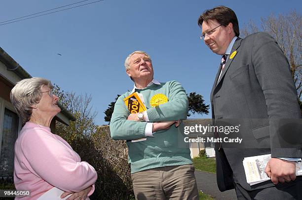 Former Liberal Democrat leader Paddy Ashdown speaks with a potential voter as he campaigns with Dan Rogerson , Liberal Democrat candidate for North...