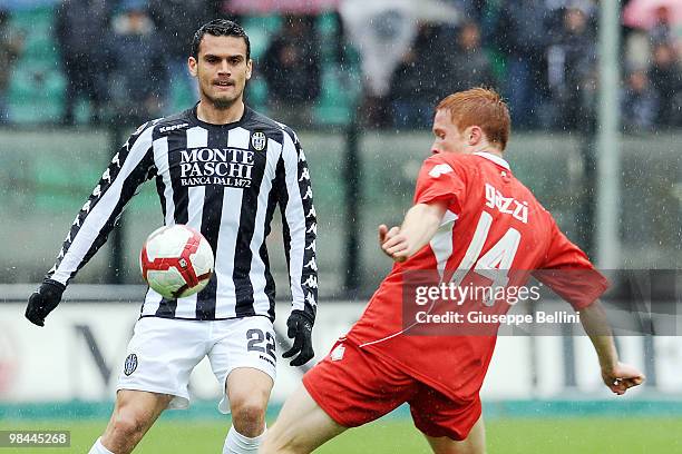 Alexandros Tziolis of Siena and Alessandro Gazzi of Bari in action during the Serie A match between AC Siena and AS Bari at Stadio Artemio Franchi on...