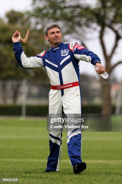 Paul Bonhomme of Great Britain throws a boomerang after the official opening of the Race Airport during the Red Bull Air Race Preview day on April...