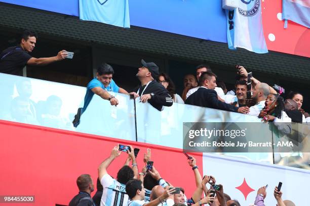 Argentina legend Diego Maradona points as fans react prior to the 2018 FIFA World Cup Russia group D match between Nigeria and Argentina at Saint...