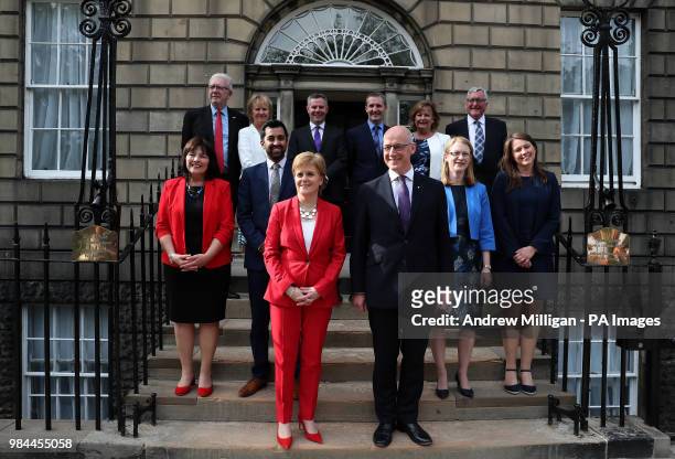 First Minister of Scotland, Nicola Sturgeon and Deputy First Minister John Swinney , with Mike Russell, Roseanna Cunningham, Derek Mackay, Michael...