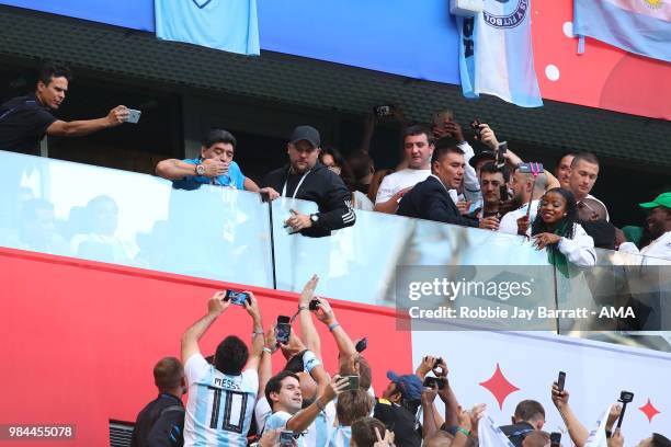 Argentina legend Diego Maradona blows a kiss as fans react prior to the 2018 FIFA World Cup Russia group D match between Nigeria and Argentina at...
