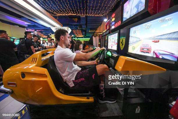 Player Klay Thompson of the Golden State Warriors play vedio games with fans on June 26, 2018 in Zhengzhou, China.
