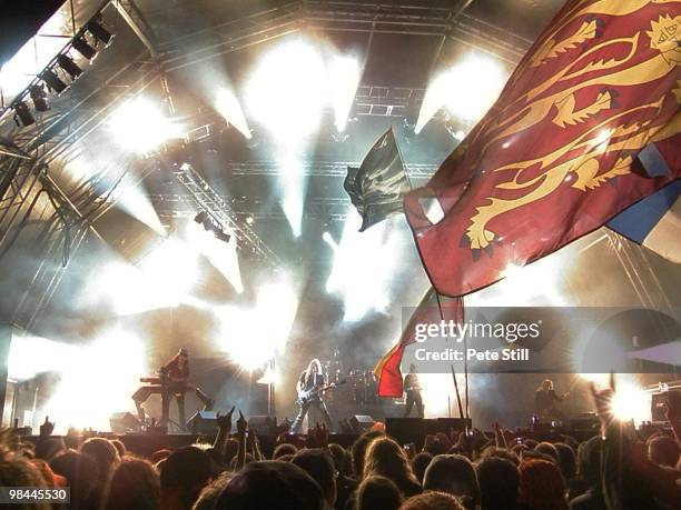 Nightwish perform on stage to an enthusiastic festival crowd including many waving large flags on poles, at Bloodstock Open Air on August 17th, 2008...